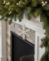 Gingerbread Snowflake Ornament With White Frosting