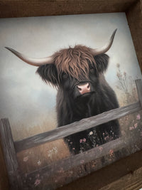 Brown Highland Cow in Field of Flowers Canvas Print