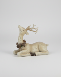 Laying Resin Distressed Deer With Wreath