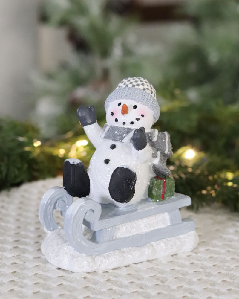 Playful Snowman Figurine