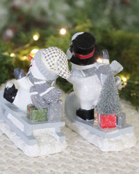 Playful Snowman Figurine