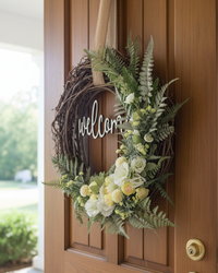 Welcome White Hollyhock and Yellow Ranunculus Fern Wreath