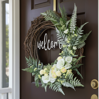 Welcome White Hollyhock and Yellow Ranunculus Fern Wreath