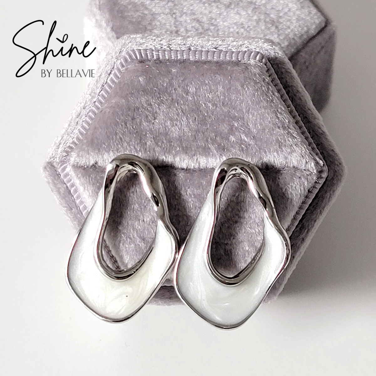 Cionne Drop Twist Earrings