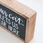 Our Cat Lets Us Live Here Mini Sign